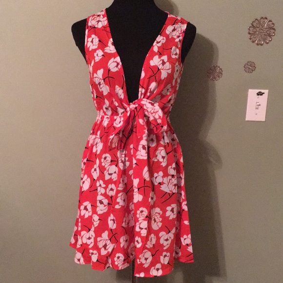 SHEIN Dresses & Skirts - Bright and cheery red dress with white flowers.